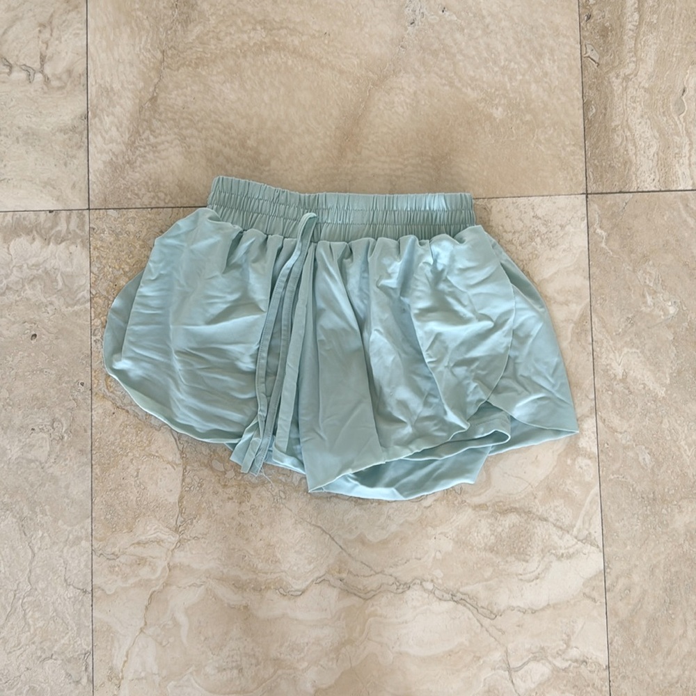 These are a girls size 7 torques skorts.